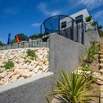 Ferienvilla Grc Mit Infinity Pool By Interhome
